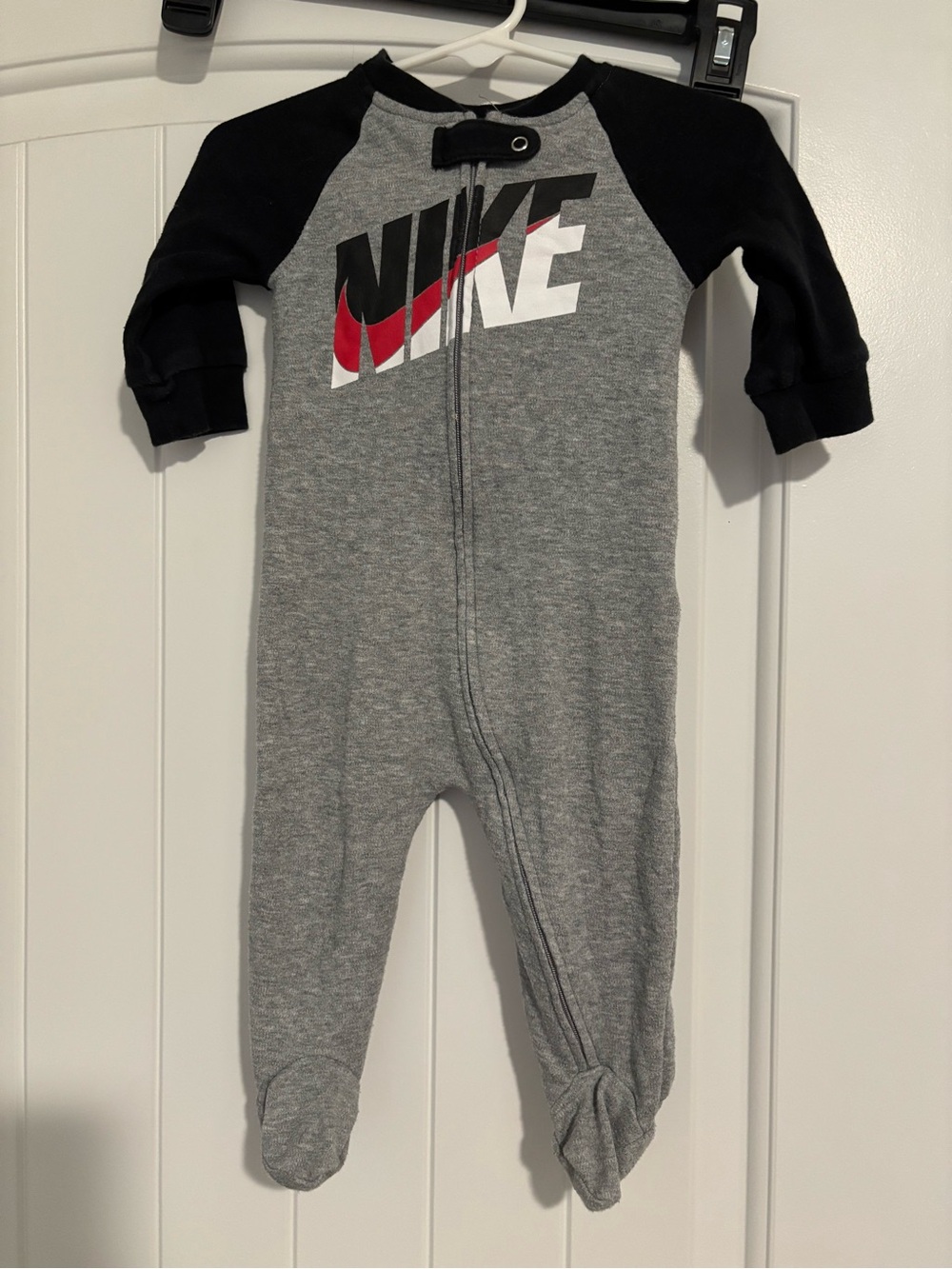 Nike Grey and Black Footed Baby One-Piece Sleeper with Red Logo